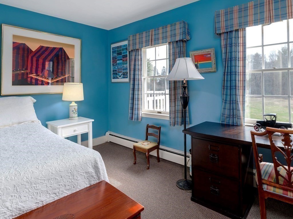 156 Larch Row Wenham, MA 01984 - Photo 24 of 38 a bedroom with a bed and a window