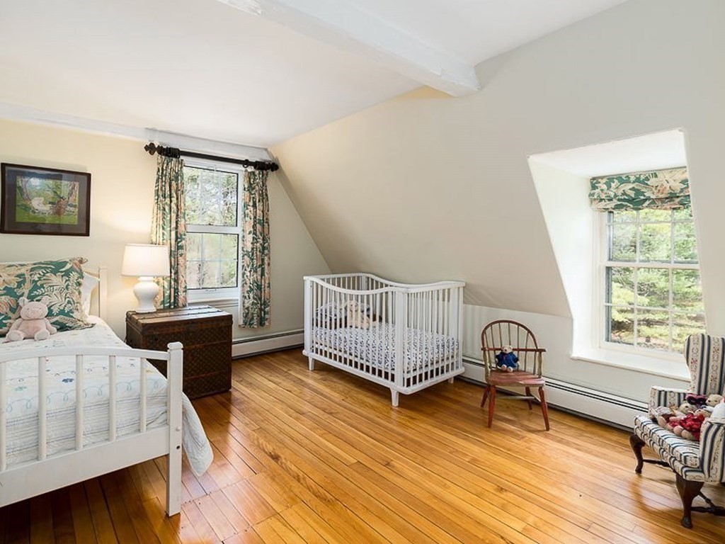 156 Larch Row Wenham, MA 01984 - Photo 25 of 38 a bedroom with furniture and a window