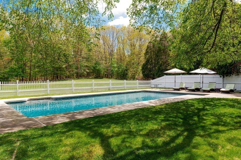 156 Larch Row Wenham, MA 01984 - Photo 33 of 38 a view of a swimming pool with a yard