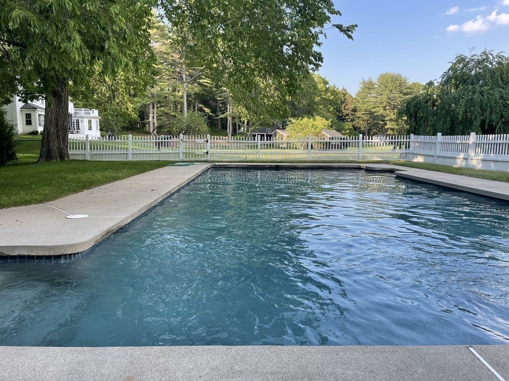 156 Larch Row Wenham, MA 01984 - Photo 34 of 38 a view of a swimming pool with a yard