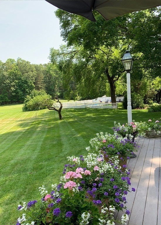 156 Larch Row Wenham, MA 01984 - Photo 4 of 38 a garden view with a fountain