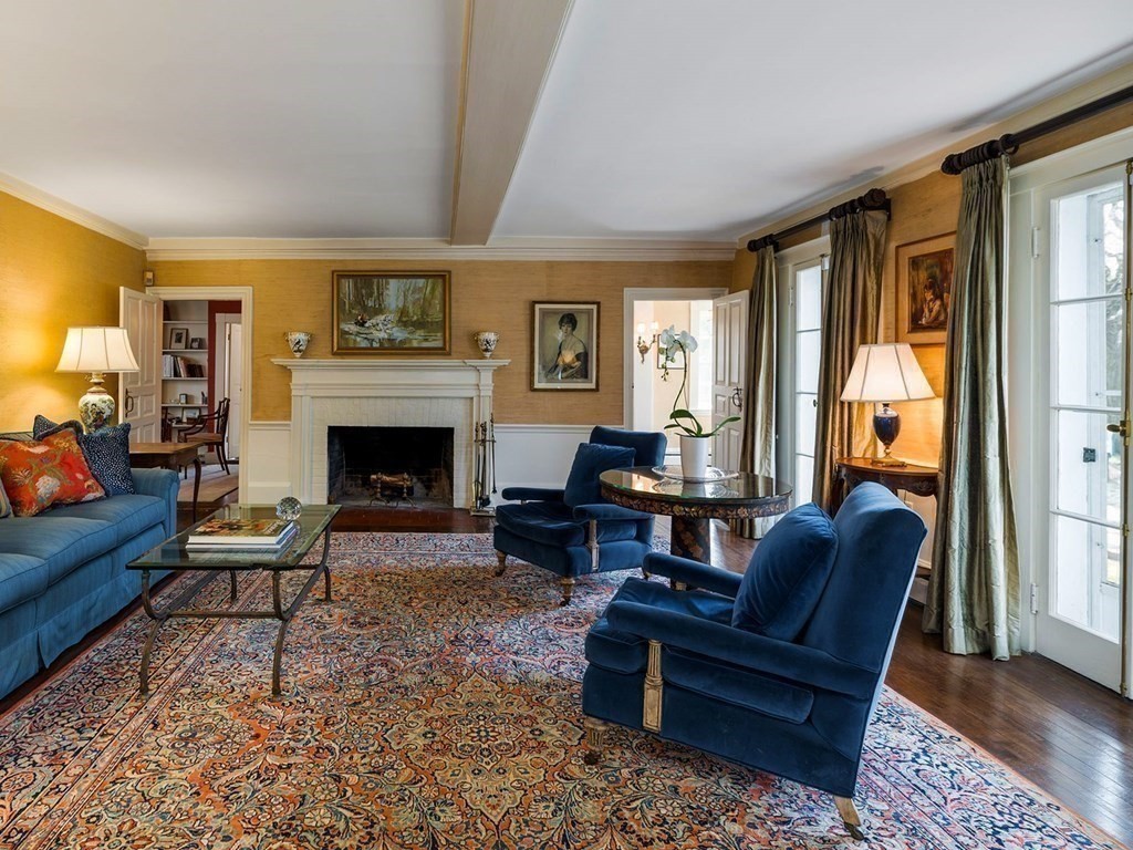 156 Larch Row Wenham, MA 01984 - Photo 6 of 38 a living room with furniture and a fireplace