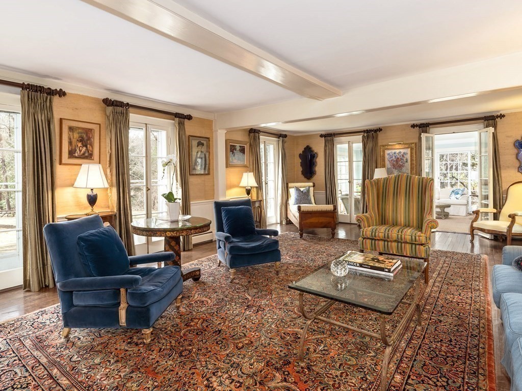 156 Larch Row Wenham, MA 01984 - Photo 7 of 38 a living room with furniture large windows and wooden floor