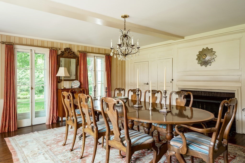 156 Larch Row Wenham, MA 01984 - Photo 9 of 38 a view of a dining room with furniture window and outside view