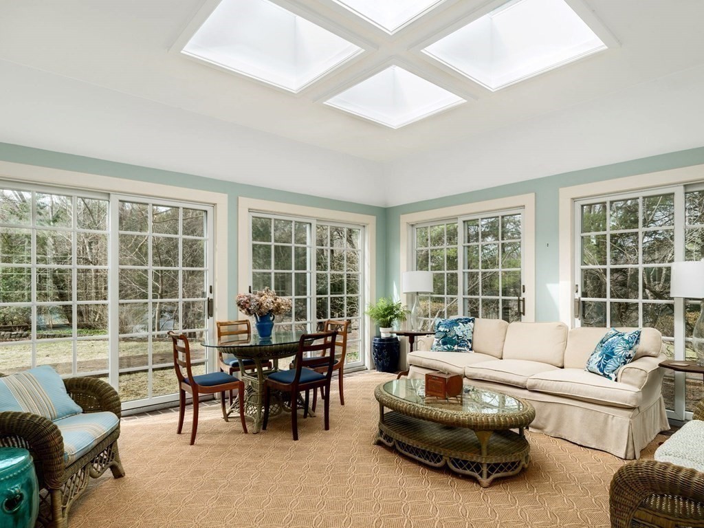 156 Larch Row Wenham, MA 01984 - Photo 10 of 38 a living room with furniture and a large window