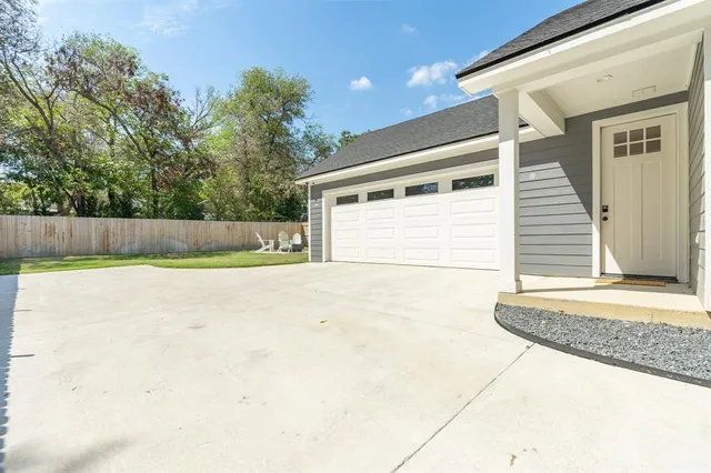 a view of a backyard of the house
