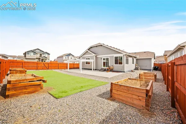 a view of a house with a swimming pool