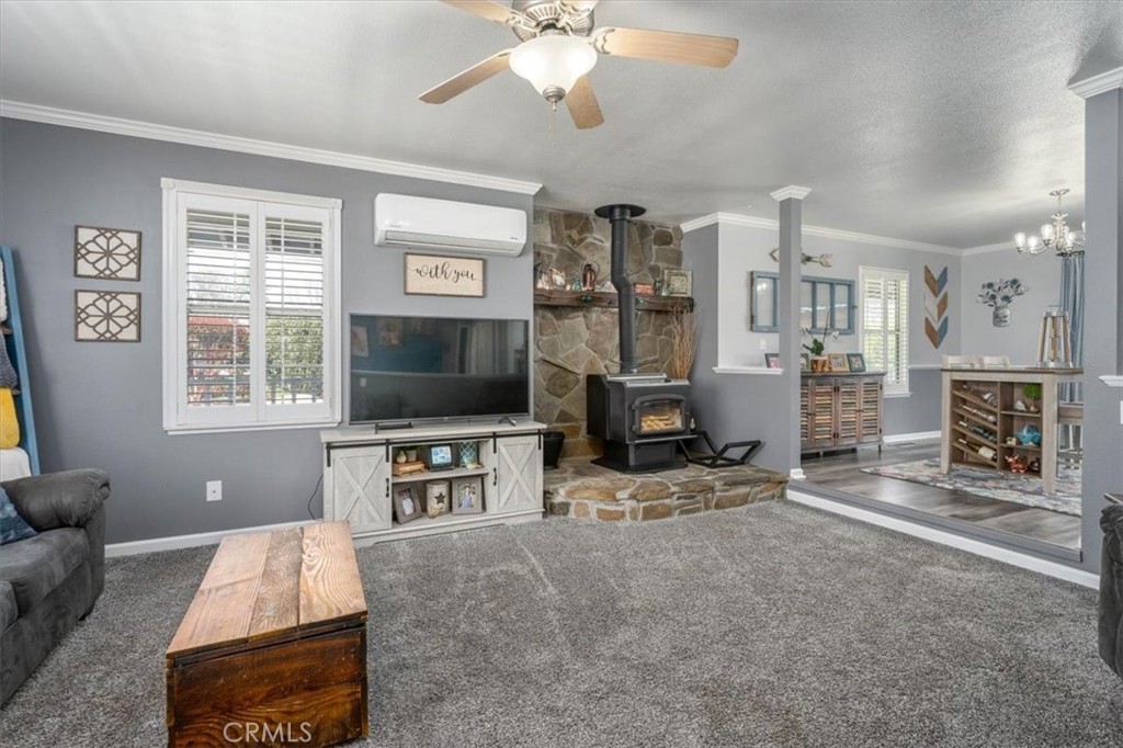 14720 McCoy Road Red Bluff, CA 96080 - Photo 11 of 49 a living room with furniture and a flat screen tv