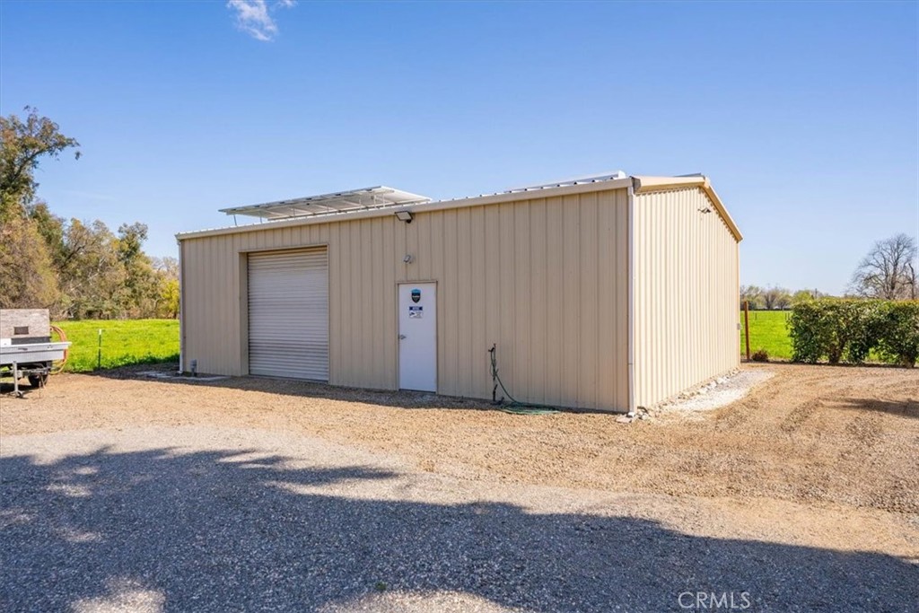 14720 McCoy Road Red Bluff, CA 96080 - Photo 44 of 49 a view of a house with backyard and garage