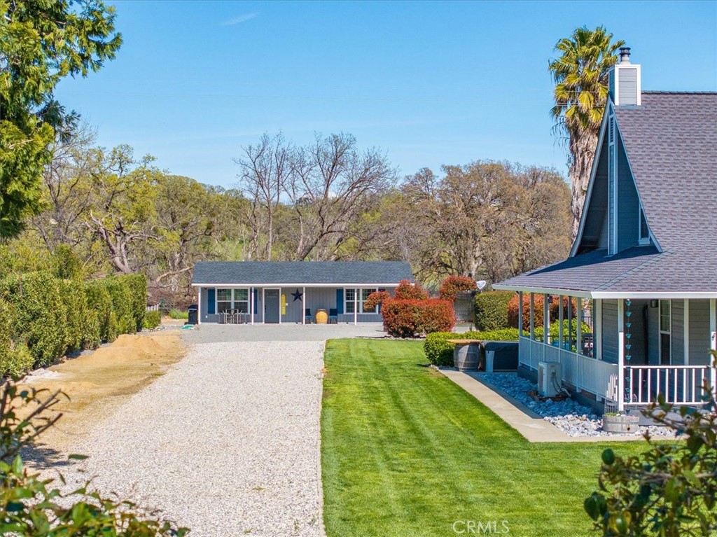 14720 McCoy Road Red Bluff, CA 96080 - Photo 48 of 49 front view of a house with a yard