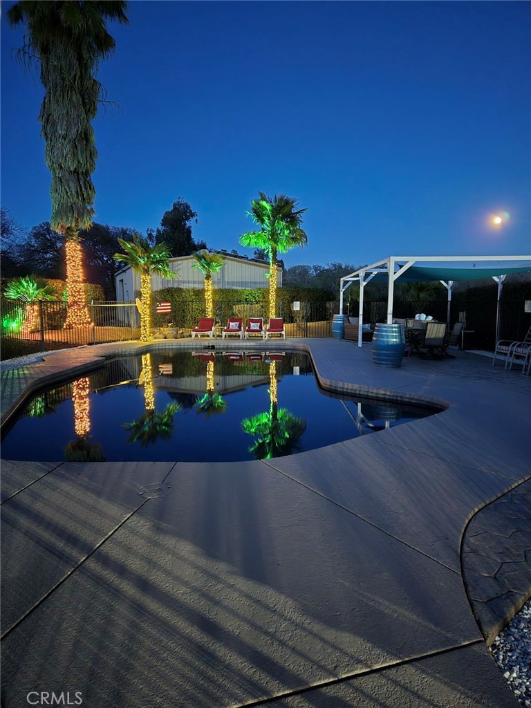 14720 McCoy Road Red Bluff, CA 96080 - Photo 49 of 49 a view of a swimming pool with a yard