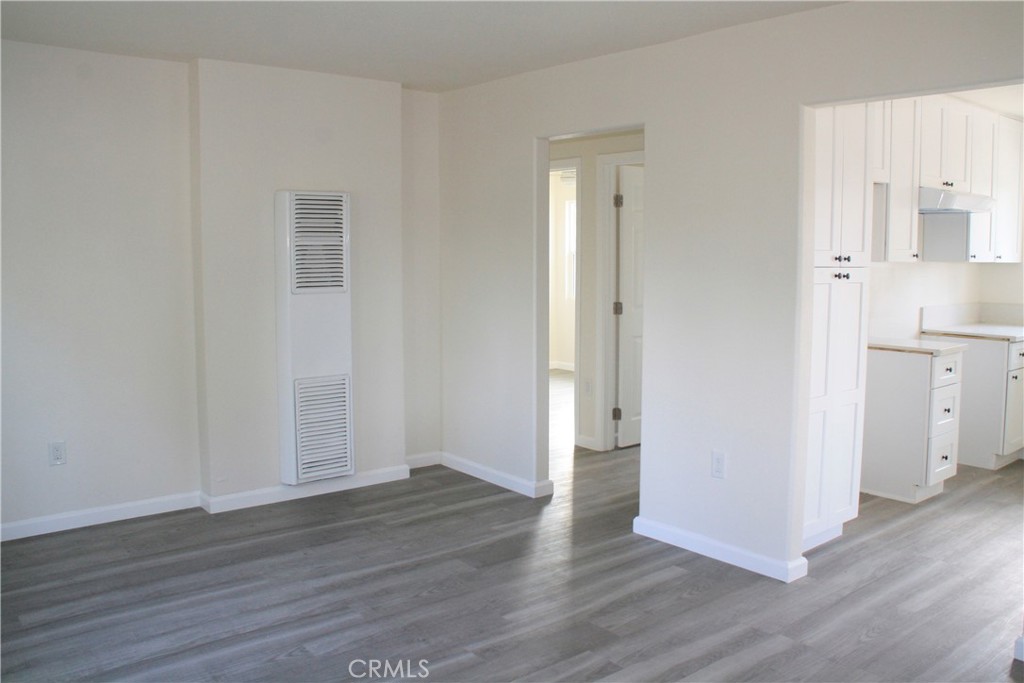 3928 Everest Avenue Riverside, CA 92503 - Photo 7 of 31 a view of empty room with wooden floor