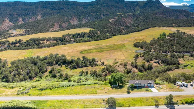 a view of lake with green space