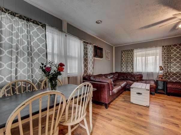 108 Powell Road Oak Ridge, TN 37830 - Photo 5 of 7 a living room with furniture and wooden floor