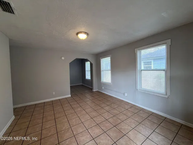 an empty room with windows