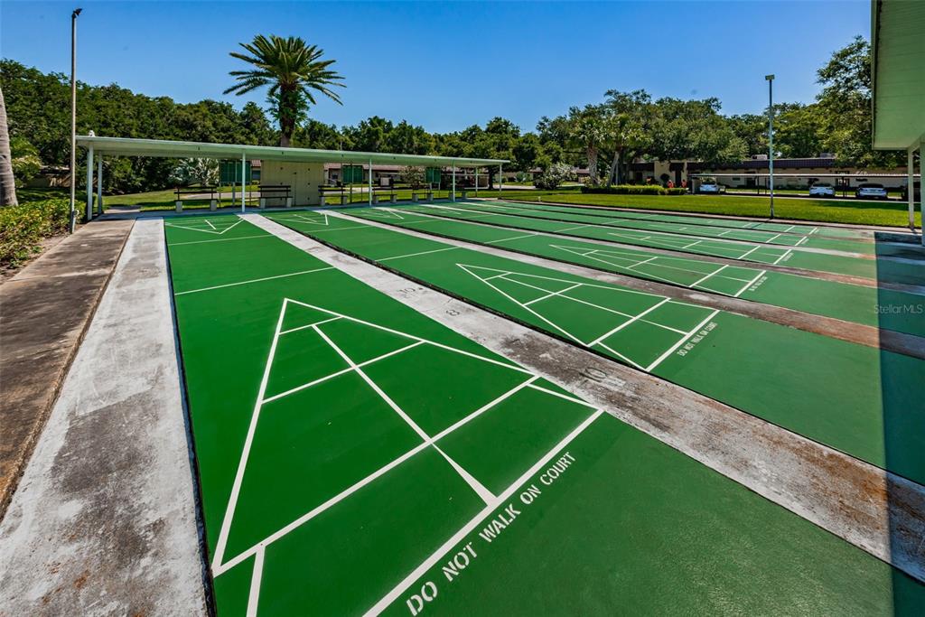 1701 Pinehurst Road, Unit 4F Dunedin, FL 34698 - Photo 49 of 56 a view of a tennis court