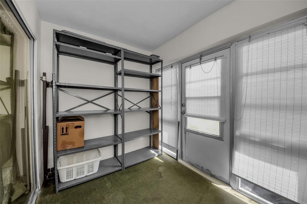 1701 Pinehurst Road, Unit 4F Dunedin, FL 34698 - Photo 8 of 56 a view of an empty room and window