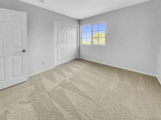 an empty room with windows