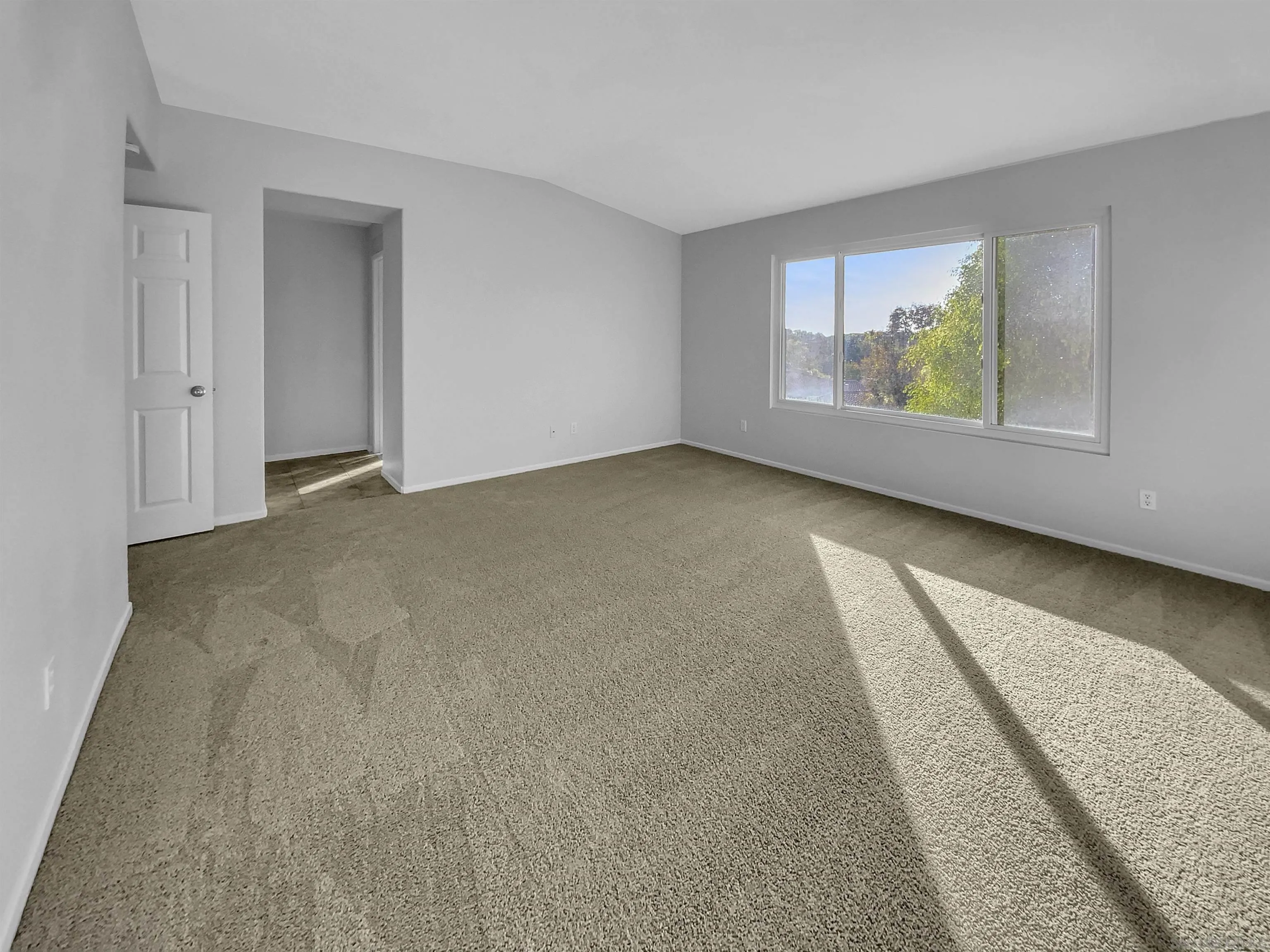 1272 Santa Lucia Road Chula Vista, CA 91913 - Photo 20 of 25 a view of an empty room with a window