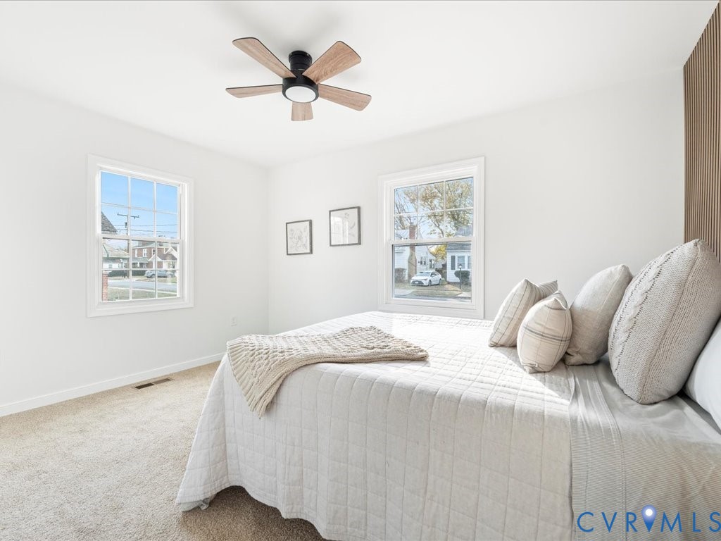 807 Hamilton Avenue Colonial Heights, VA 23834 - Photo 25 of 39 a bedroom with a large bed and a window