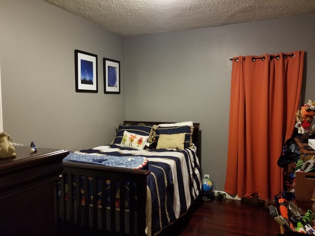 18 Mott Street Fall River, MA 02721 - Photo 15 of 27 a bedroom with a bed and a window