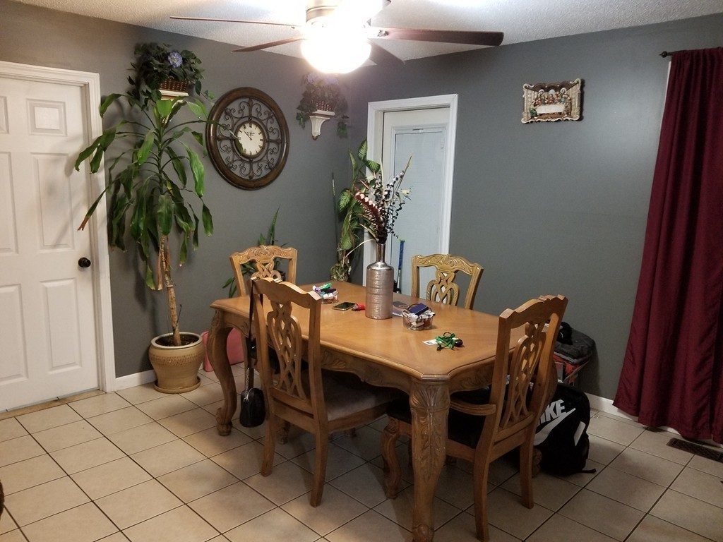 18 Mott Street Fall River, MA 02721 - Photo 2 of 27 a view of a dining room with furniture and a table