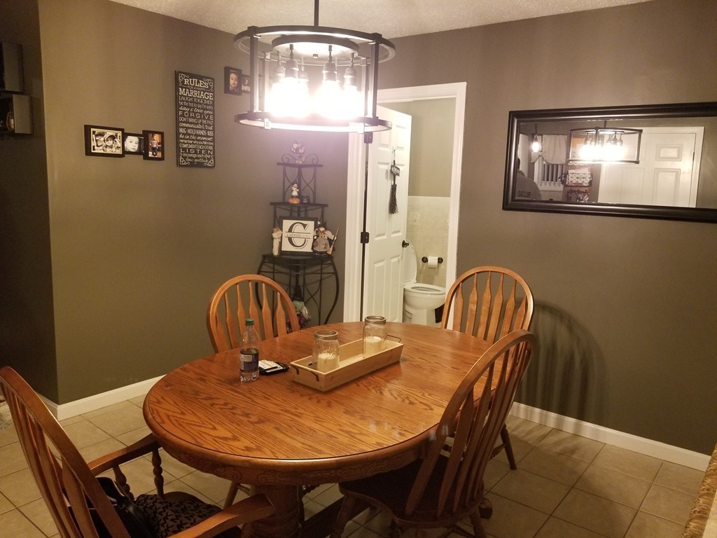18 Mott Street Fall River, MA 02721 - Photo 9 of 27 a view of a dining room with furniture