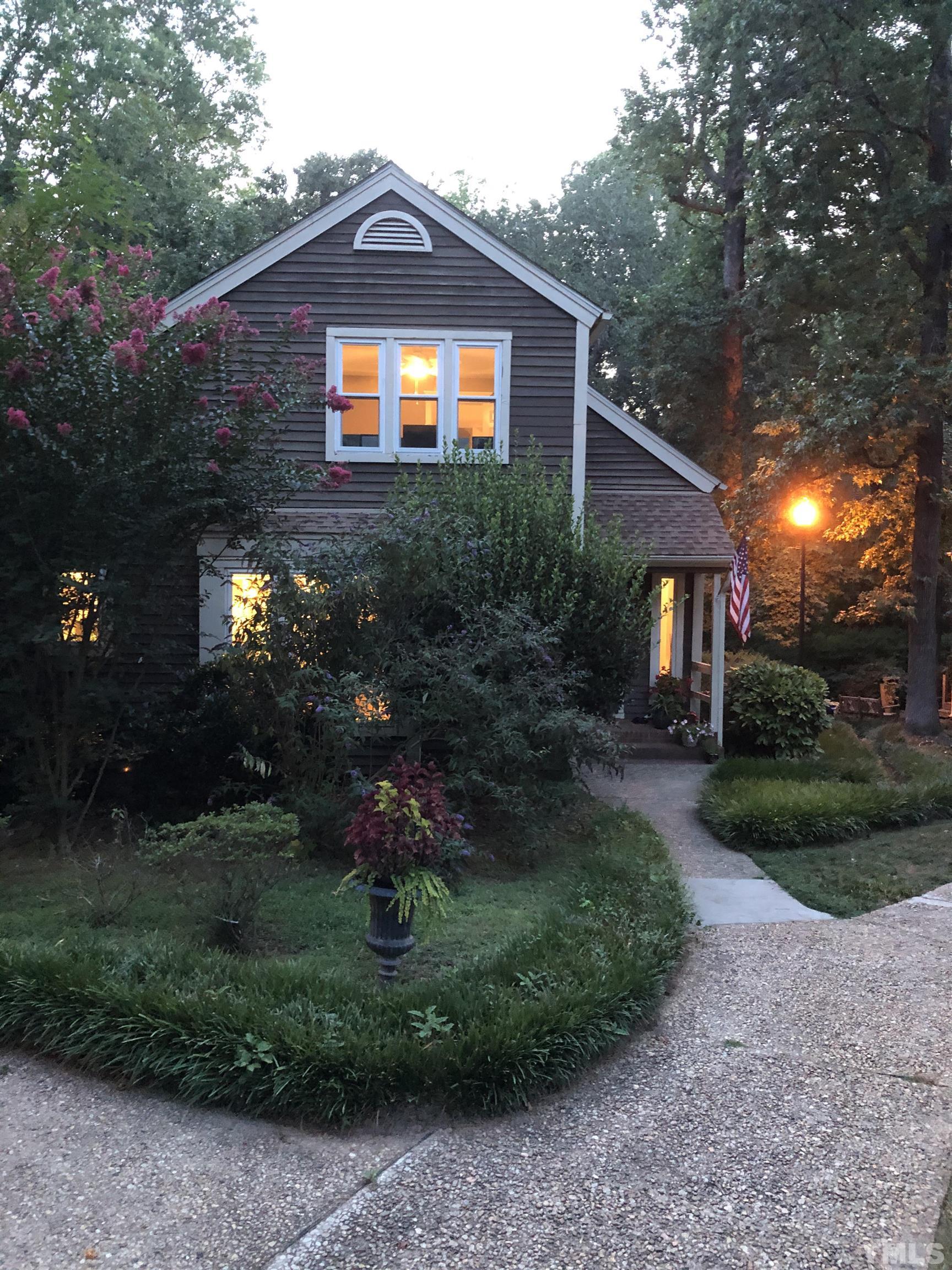 5811 Sentinel Drive Raleigh, NC 27609 - Photo 2 of 20 a front view of a house with a yard