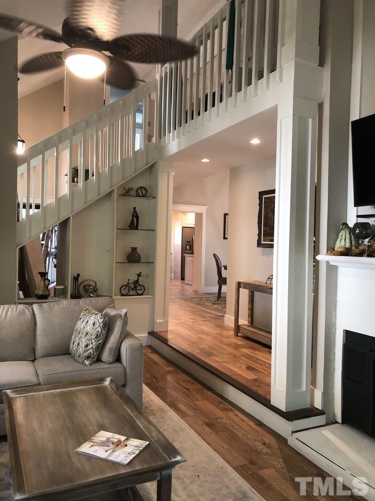 5811 Sentinel Drive Raleigh, NC 27609 - Photo 15 of 20 a living room with furniture and a fireplace