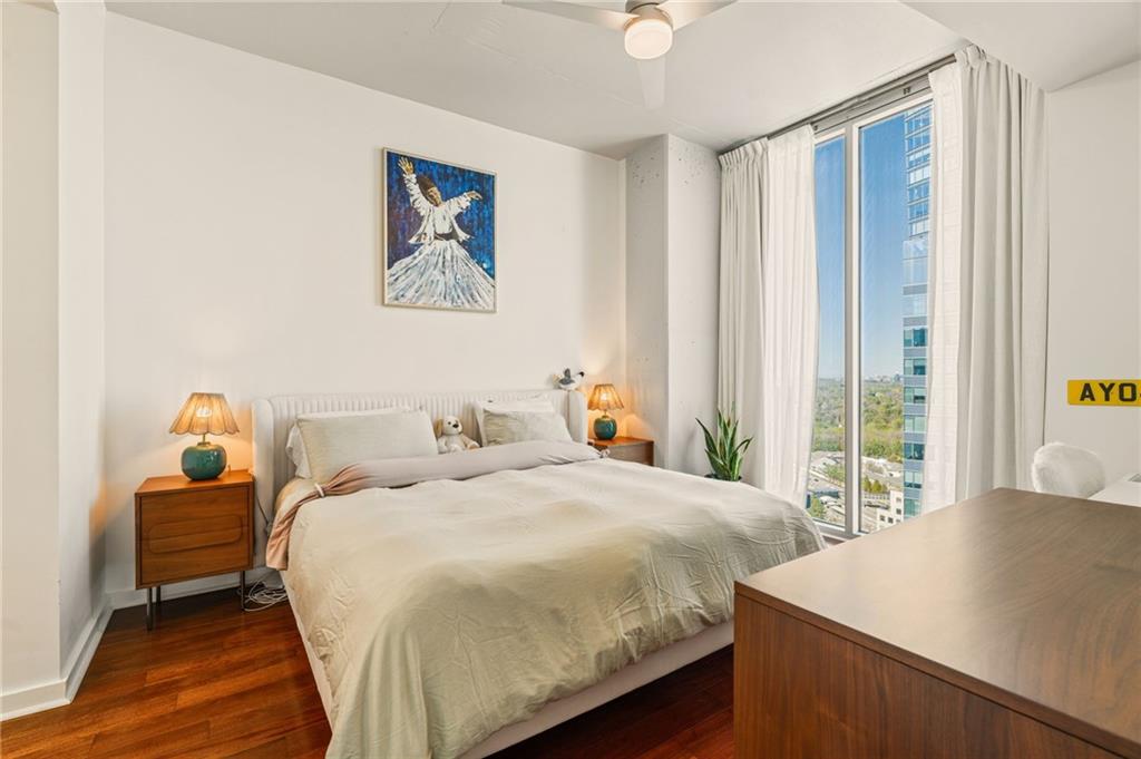3324 Peachtree Road Northeast, Unit 2705 Atlanta, GA 30326 - Photo 20 of 68 a bedroom with a bed and a window
