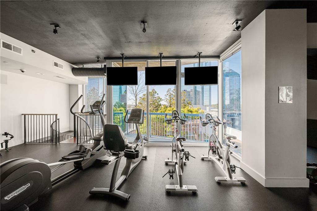 3324 Peachtree Road Northeast, Unit 2705 Atlanta, GA 30326 - Photo 50 of 68 a view of a room with gym equipment