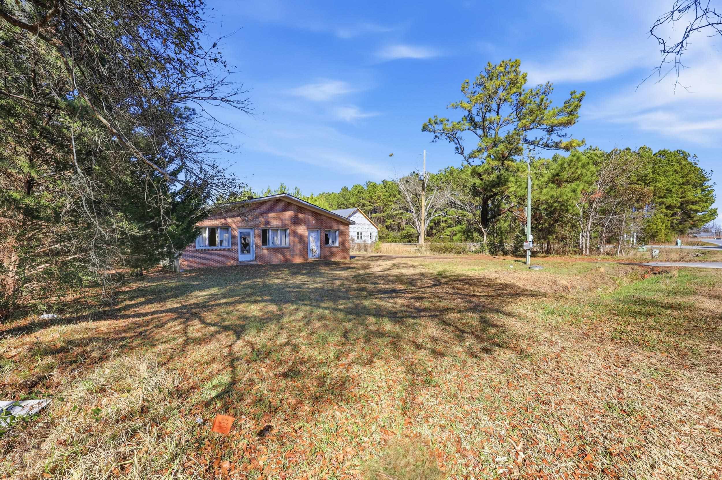 57 Little River Longs, SC 29568 - Photo 4 of 6 View of green lawn