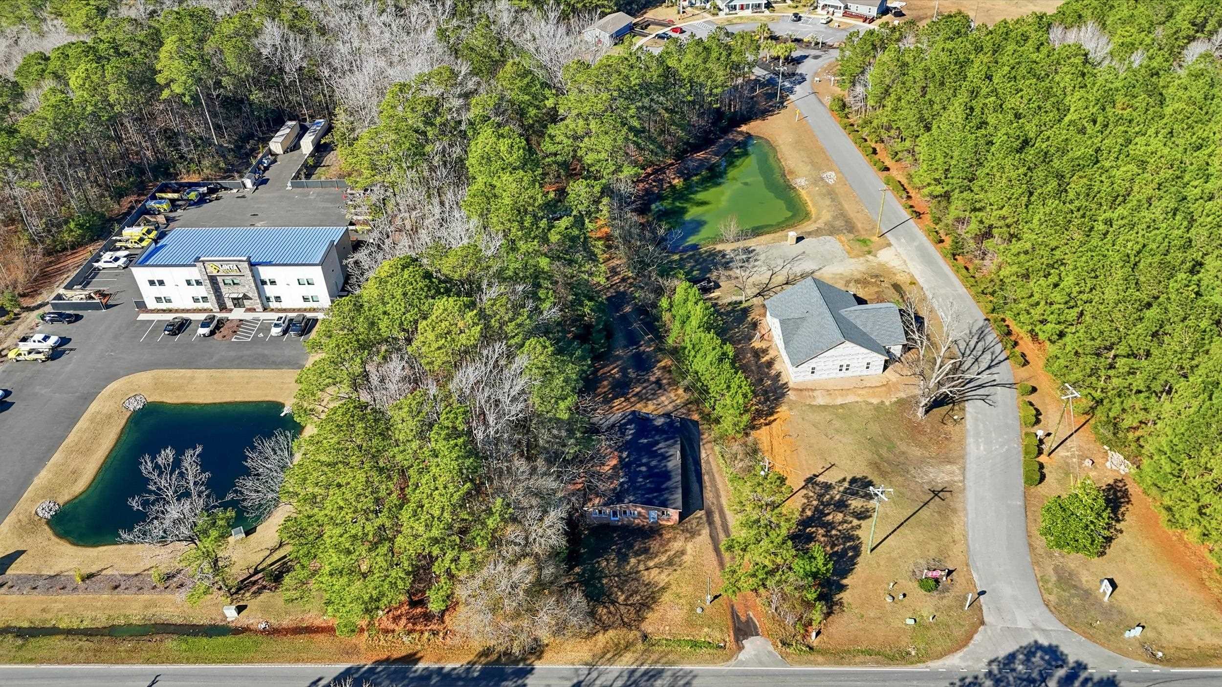 57 Little River Longs, SC 29568 - Photo 5 of 6 Drone / aerial view of a nearby body of water