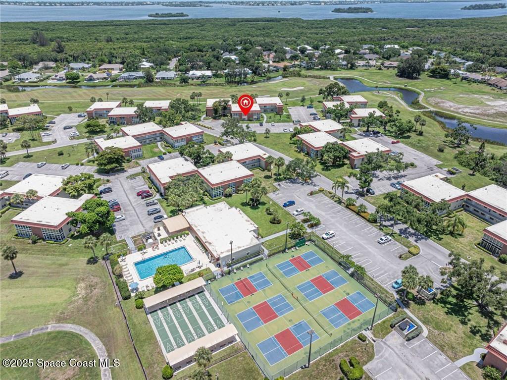 25 Pine Arbor Lane, Unit 104 Vero Beach, FL 32962 - Photo 15 of 34 an aerial view of residential houses with outdoor space