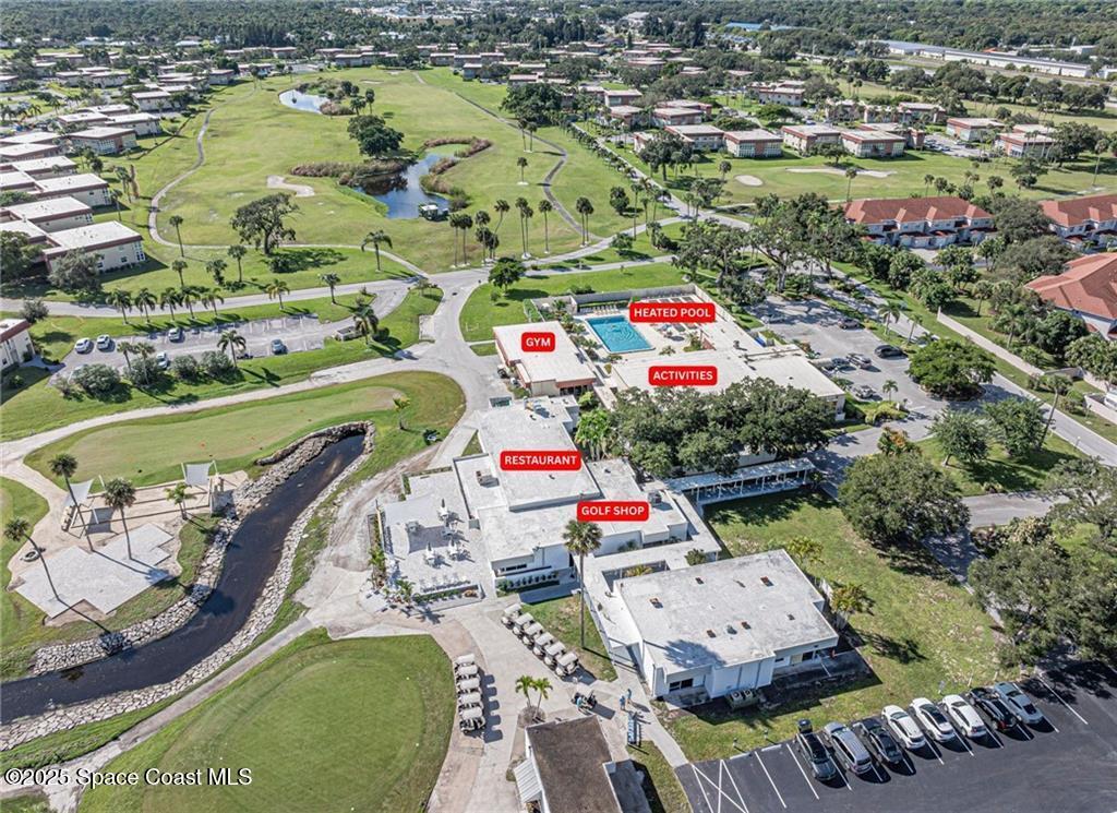 25 Pine Arbor Lane, Unit 104 Vero Beach, FL 32962 - Photo 30 of 34 an aerial view of a house with a lake view