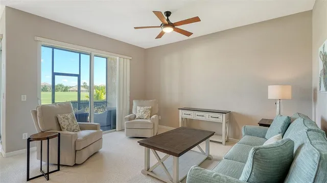 a living room with furniture and a couch