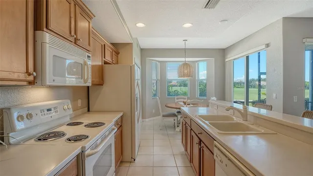a bathroom with a sink double vanity and shower
