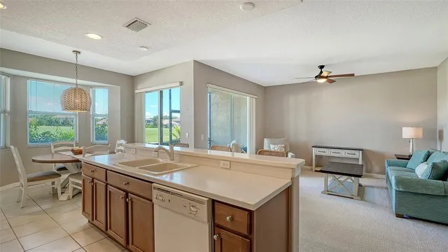 a bathroom with a shower and a sink