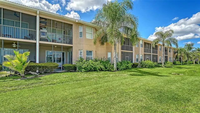 a view of a swimming pool and a yard