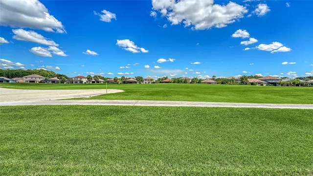 a view of a fountain in front of house
