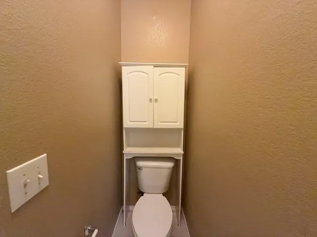 a bathroom with a toilet