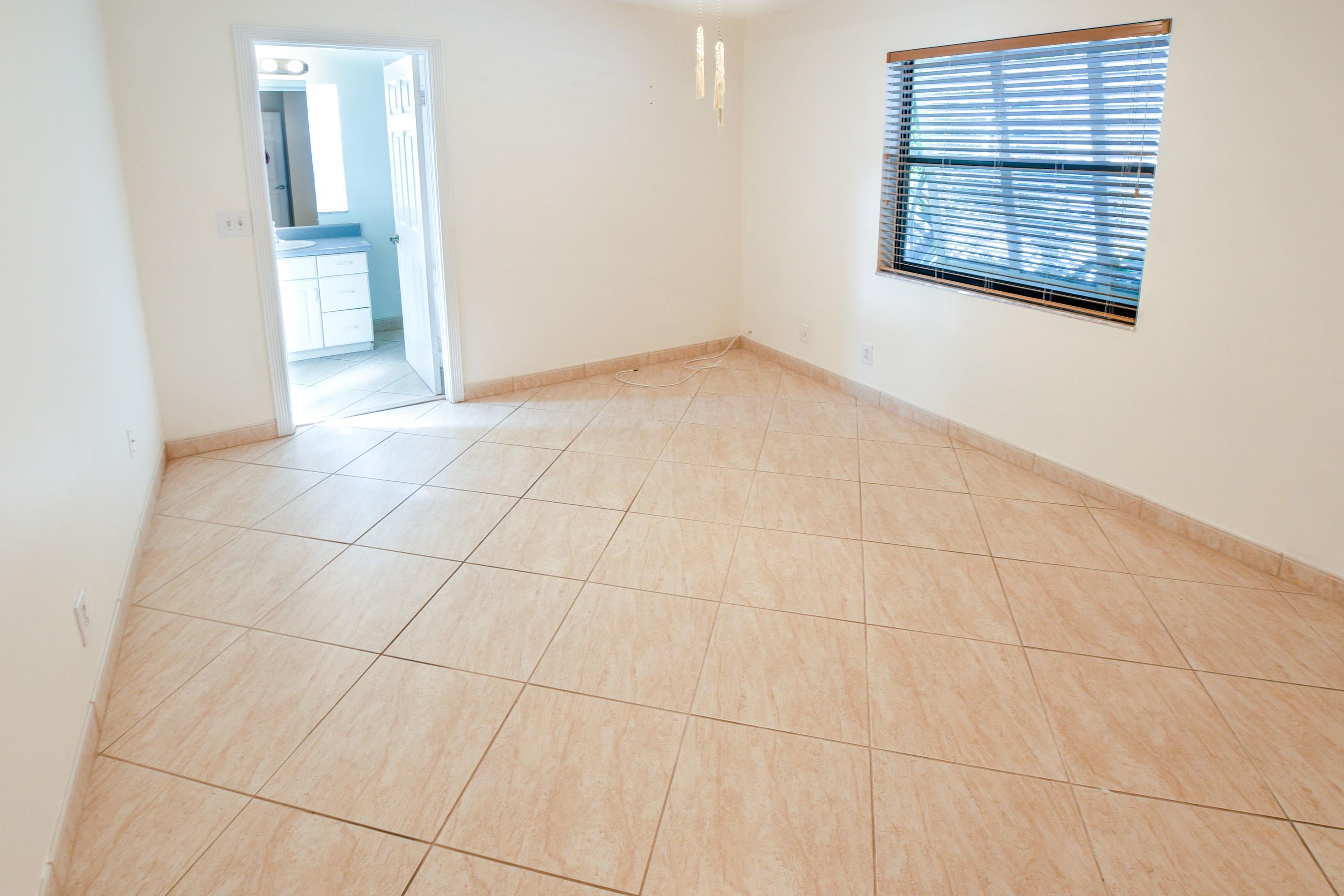 2462 Flamingo Road Palm Beach Gardens, FL 33410 - Photo 17 of 39 Bed 2 with ensuite