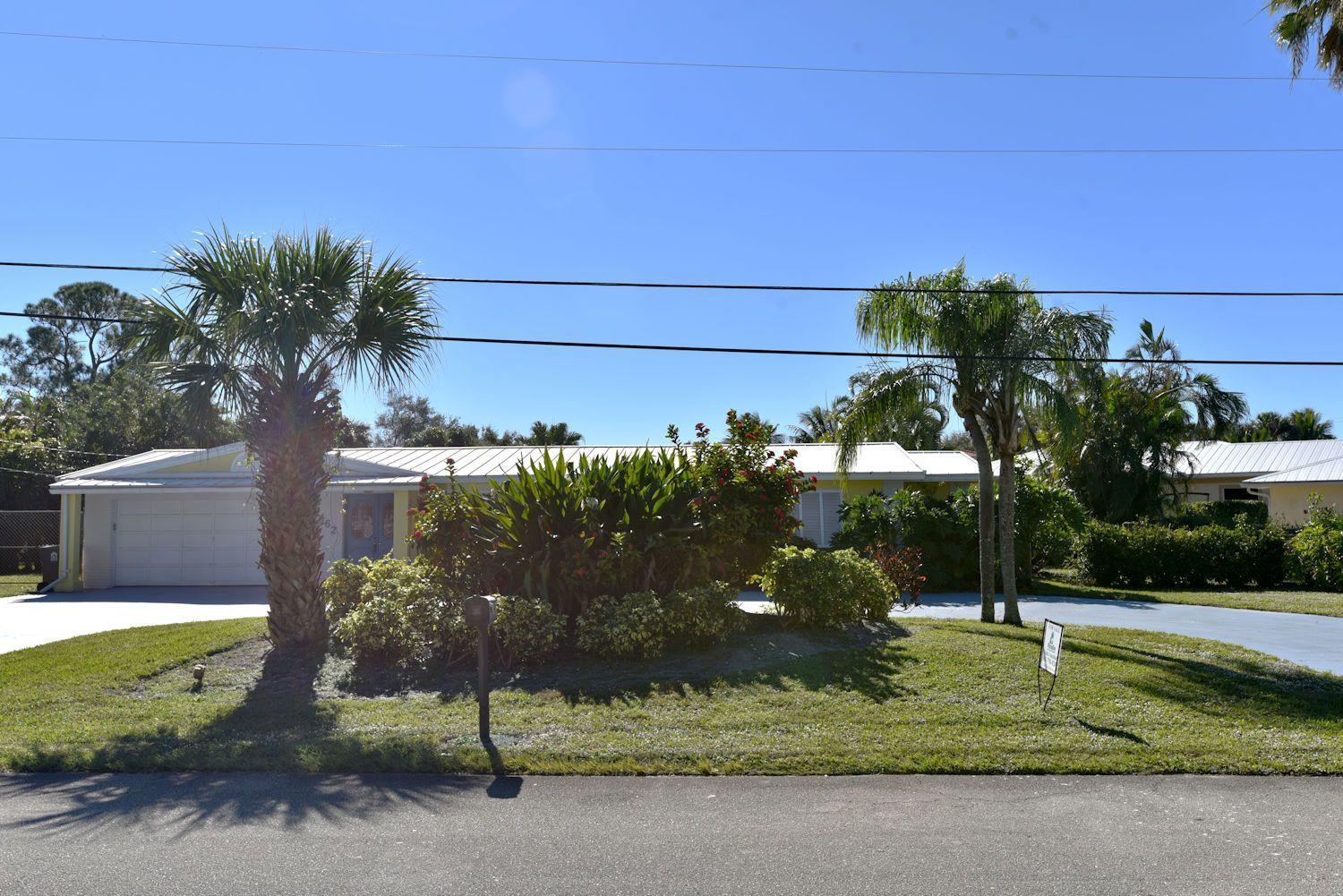 2462 Flamingo Road Palm Beach Gardens, FL 33410 - Photo 6 of 39 Front Exterior