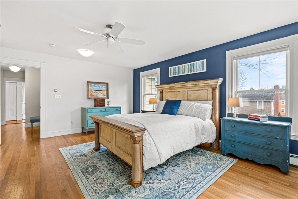 7 Water Street Natick, MA 01760 - Photo 13 of 26 a bedroom with a bed and window