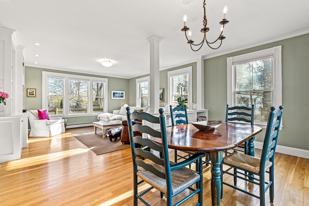 7 Water Street Natick, MA 01760 - Photo 6 of 26 a view of a dining room with furniture window and wooden floor