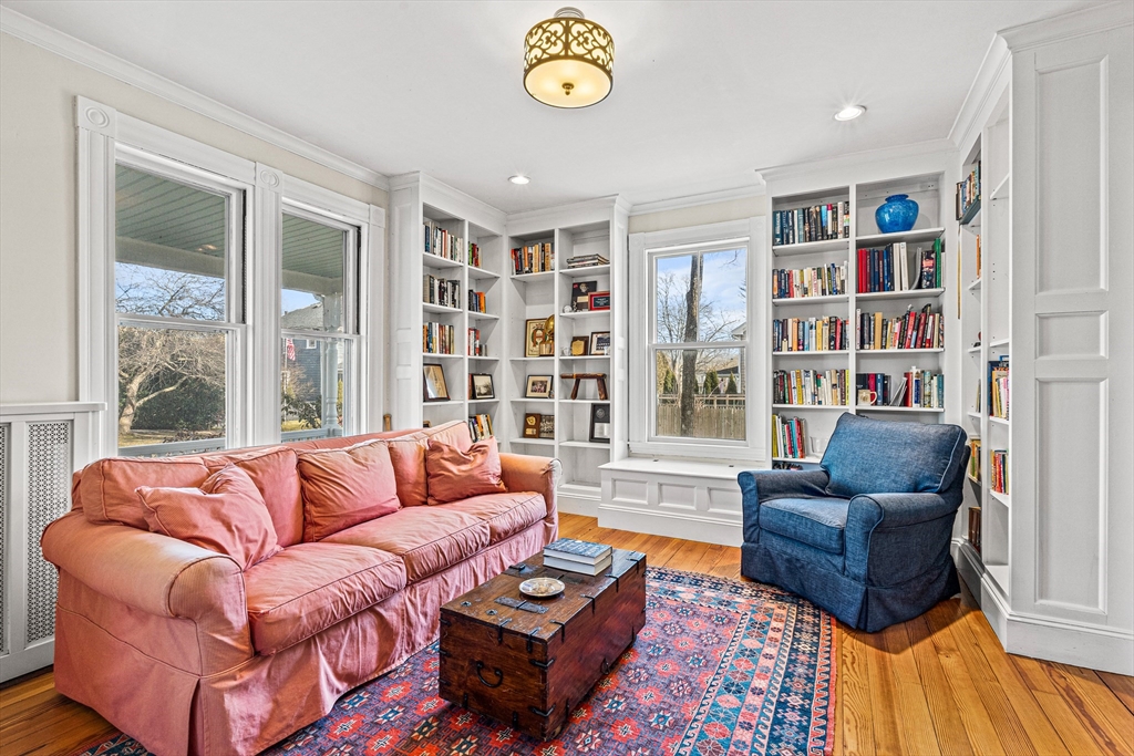 7 Water Street Natick, MA 01760 - Photo 10 of 26 a living room with furniture and a window