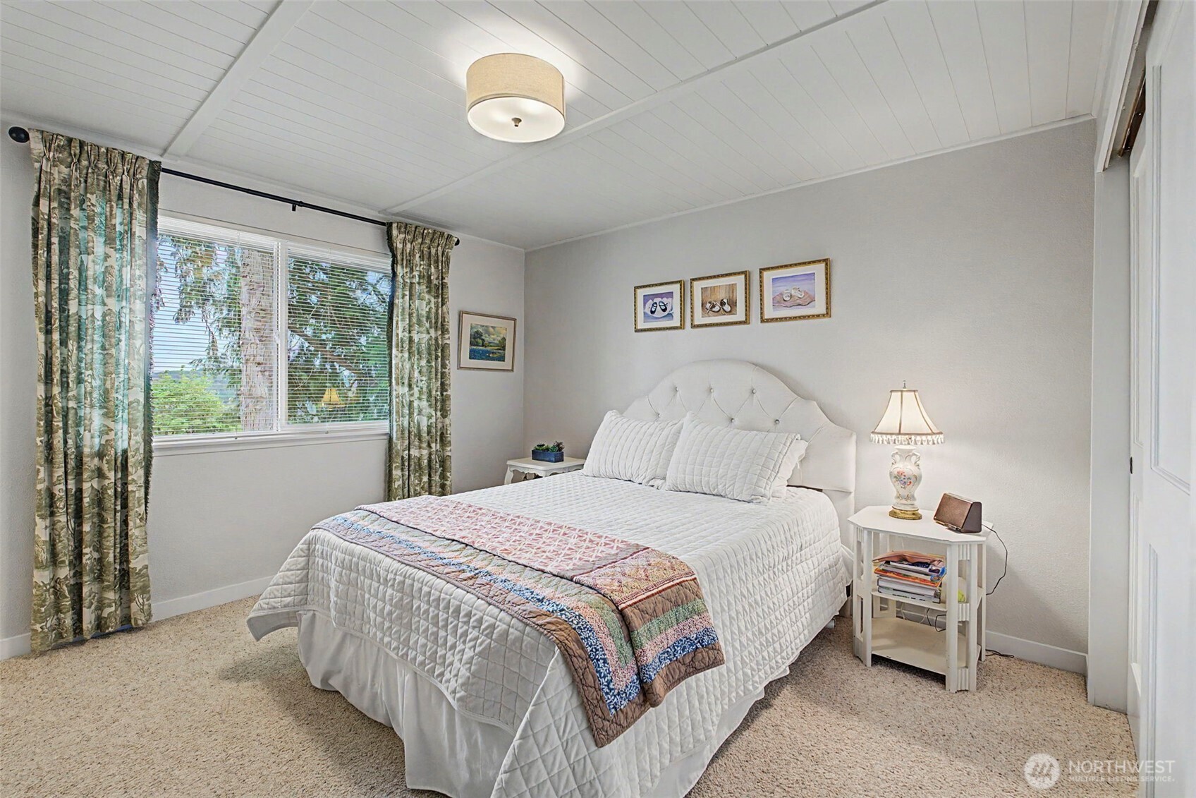1611 Ham Hill Road Centralia, WA 98531 - Photo 17 of 40 a bedroom with a bed and a large window