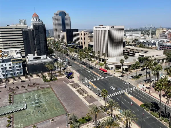 a view of city with tall buildings