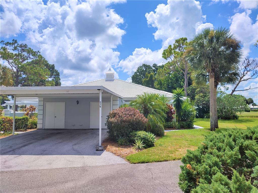 276 Cerromar Way South, Unit 60 Venice, FL 34293 - Photo 1 of 31 a view of a backyard