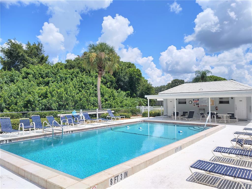 276 Cerromar Way South, Unit 60 Venice, FL 34293 - Photo 28 of 31 a view of a swimming pool with a patio